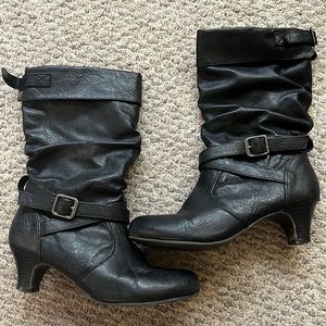 Size 4 black Faded glory heeled boots. Fits size 5 in heels/size 6 tennis shoes.